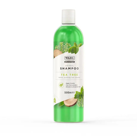 Green translucent bottle of wahl tea tree shampoo 500ml with perfectly balanced formula for animals