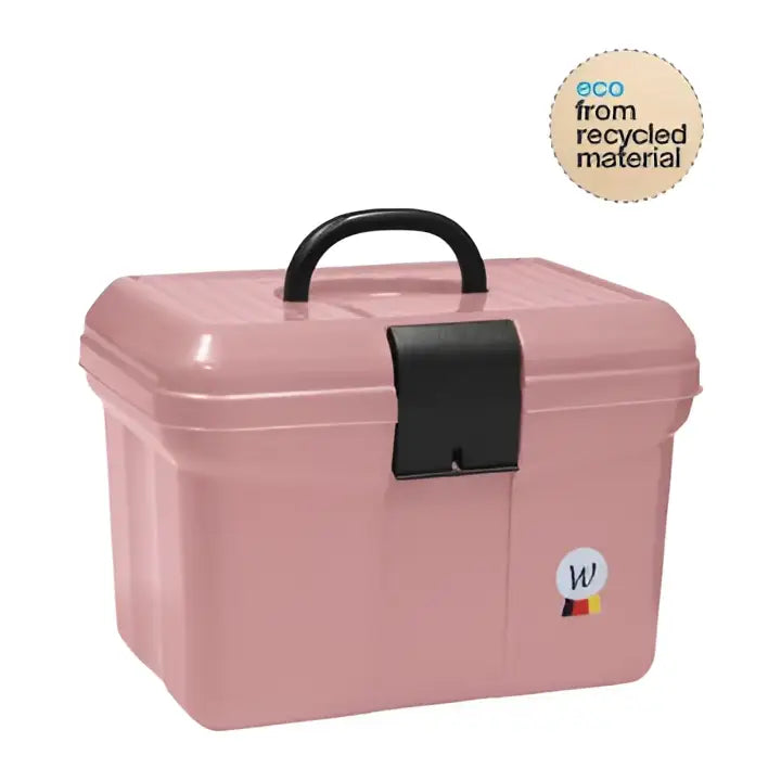 Pink plastic waldhausen grooming box with black handle and latch featuring a small circular logo on the side