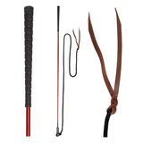 Red and black waldhausen natural horsemanship touch stick with textured grip leather strap and metal tip riding crop