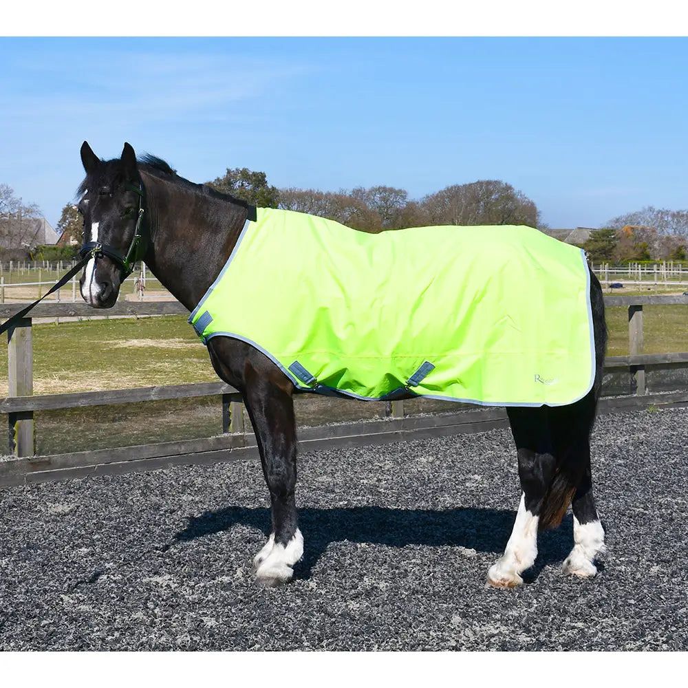 Bright lime green walker lunge rug by rhinegold with reflective trim and adjustable straps for horse walker rugs use