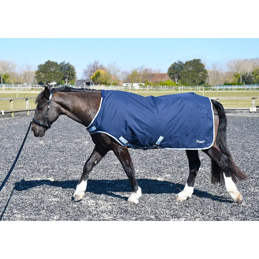 Navy blue walker lunge rug by rhinegold with white trim and reflective strips, a handy horse rug and horse walker rug
