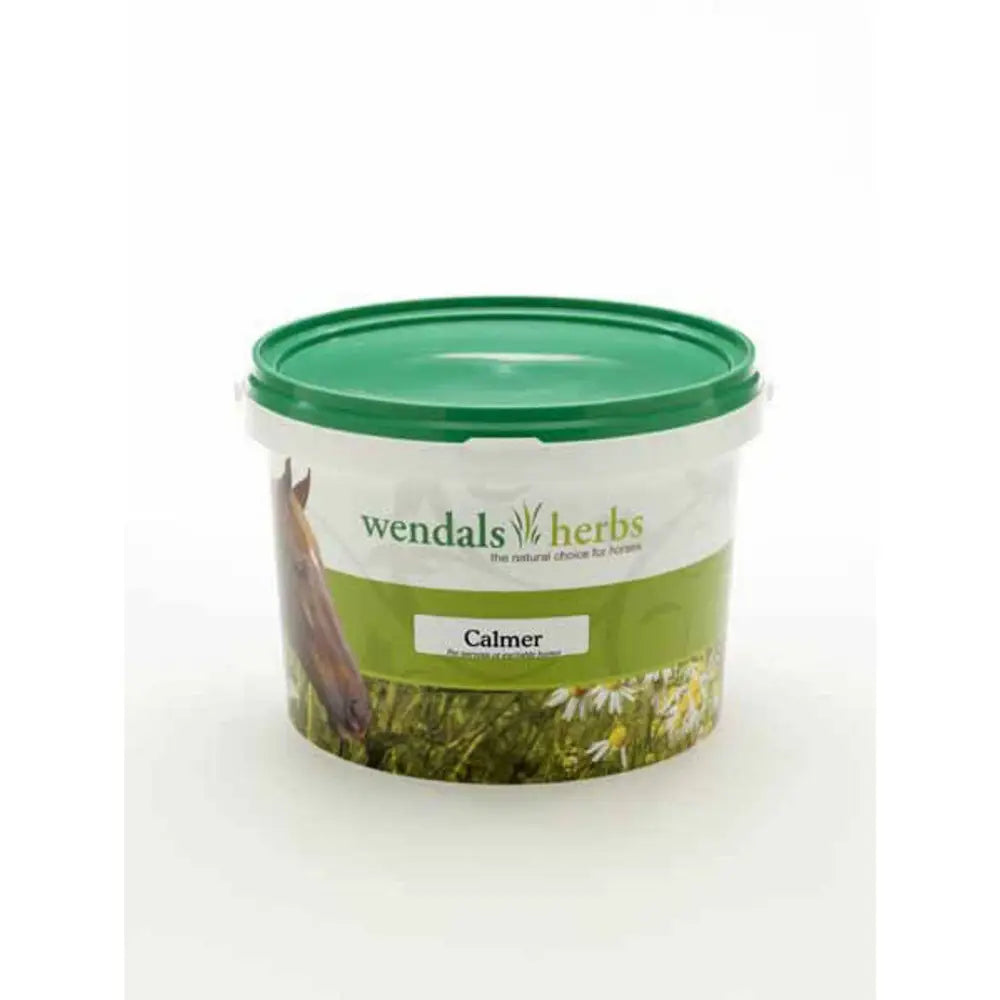 Green-lidded plastic tub of wendals calmer herbal supplement for excitable horses and horse vitamins