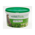 Green and white plastic tub of wendal’s devil’s claw herbal supplement to reduce winter stiffness in horses