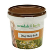 A white plastic tub with a brown lid labeled wendals dog stop itch featuring a dog and daisies with a special mixture designed to stop dog itch