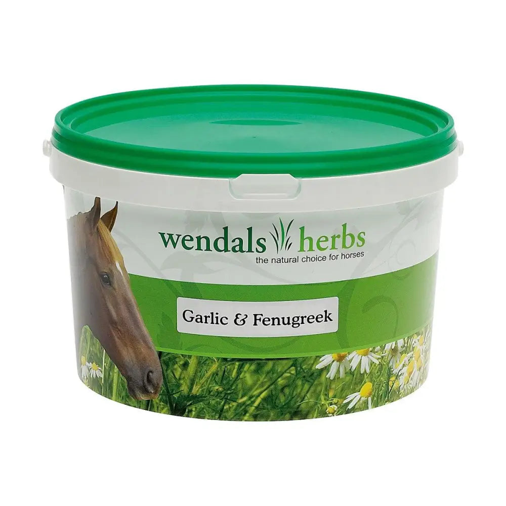 Green-lidded plastic tub of wendals garlic and fenugreek horse supplements with label showing brown horse and daisy field