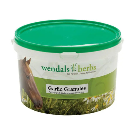 Green-lidded white plastic container of wendals garlic granules for horse supplements with horse and daisies label