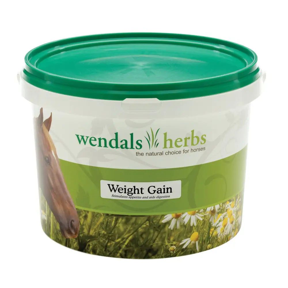 Green-lidded plastic tub of wendals weight gain horse supplements with daisies and horse head for younger horses
