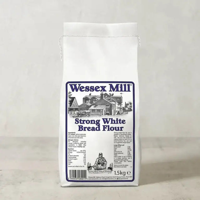 White paper bag of wessex mill strong white bread flour 1.5kg with blue black label and mill illustration