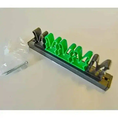 Green plastic cookie cutter set with black metal handles for leaf and flower shapes with fitting screws whip holder clip