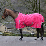 Bright pink whitaker 0g standard turnout rug with gray trim and adjustable straps featuring umbrella tail cover