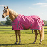 Bright pink whitaker 0g standard turnout rug pink with gray trim adjustable straps and small side logo