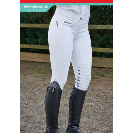 White performance riding pants with subtle logo and vertical stitching details whitaker b123 dortmund breeches