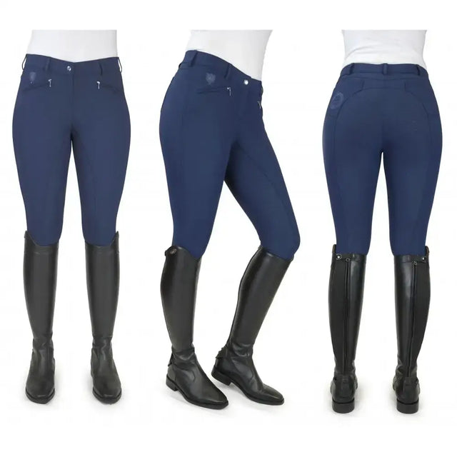 Navy blue whitaker b167 lyon performance breeches with zippered pockets and a sleek form-fitting design