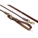 Brown leather draw reins rope with brass hardware by whitaker draw reins for durable training use