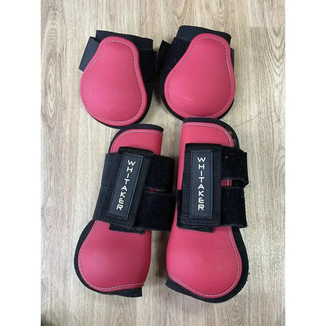 Pink and black whitaker lp025 skipton tendon and fetlock boots set pink with padded protective design