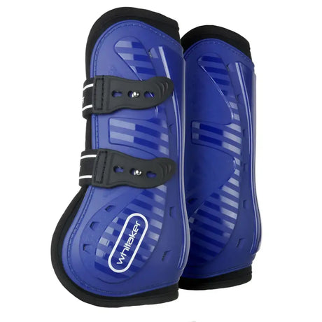 Bright blue whitaker lp083 bingley tendon boots with black trim and dual velcro straps for horse protection