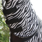 Black and white zebra-striped mesh fly rug zebra with adjustable black elastic straps from whitaker r236 marwell fly rug