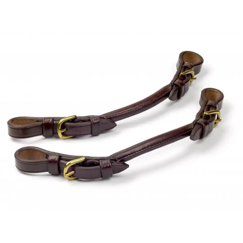 Brown leather whitaker pr pelham roundings horse reins with gold buckles featuring two points design