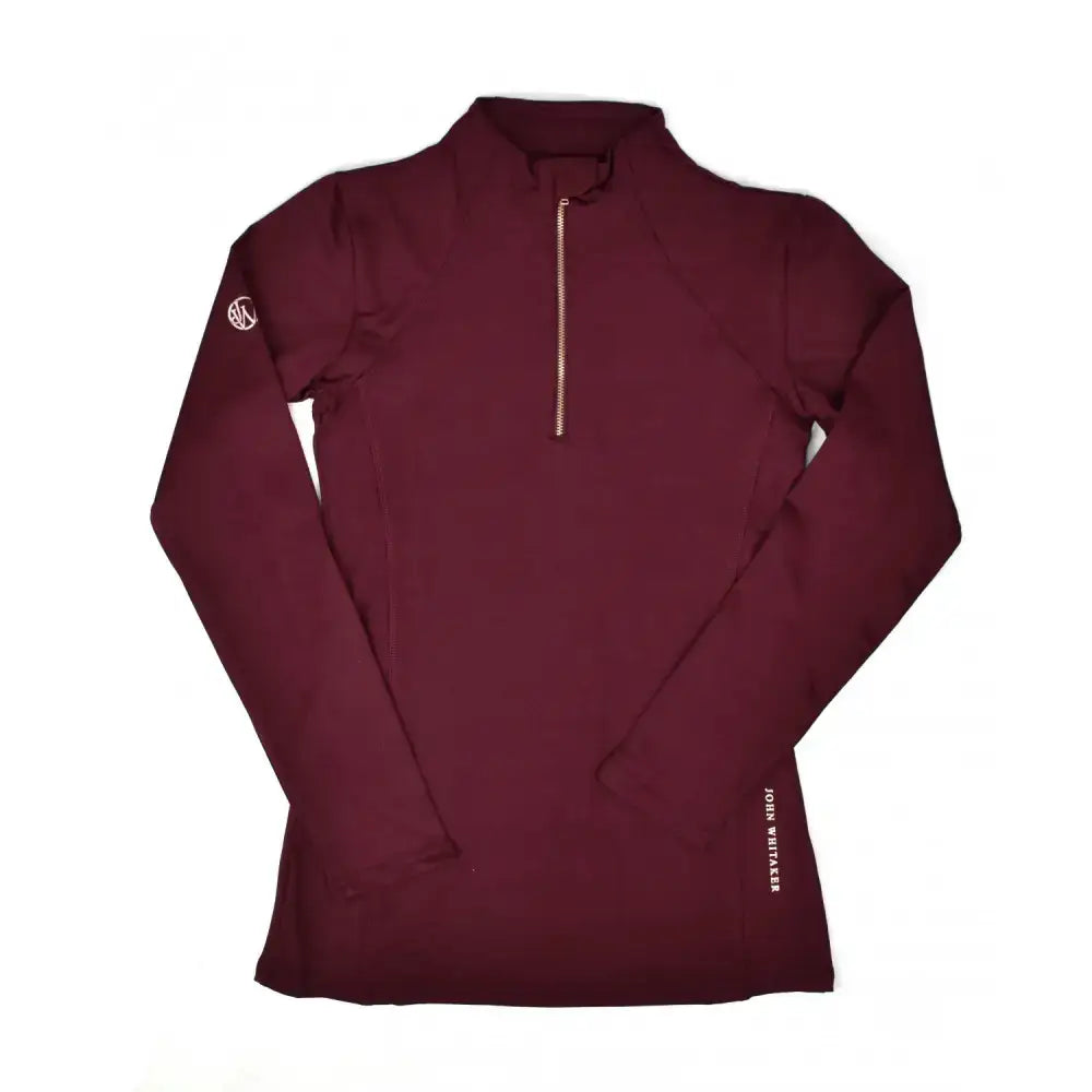Maroon long-sleeved whitaker ps074 legend training baselayer with subtle logo and champagne gold brand text on side seam