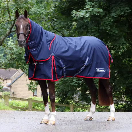 Navy blue whitaker r441 rastrick fixed neck turnout rug with red trim and white branding for warmth and protection