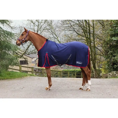 Navy blue whitaker r471 rastrick stable sheet with red trim black straps and white logo on the side sheet navy