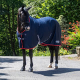 Navy blue whitaker r475 rastrick cooler rug with red trim t-clip chest fastenings and belly surcingles black buckles