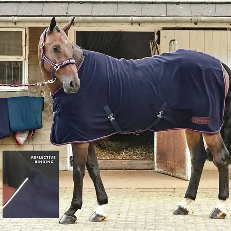 Navy blue whitaker rastrick fleece rug with reflective binding and black straps for horse warmth and safety