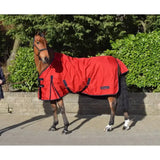 Red horse blanket with black trim adjustable straps and small brand label in whitaker rastrick turnout classically styled rug