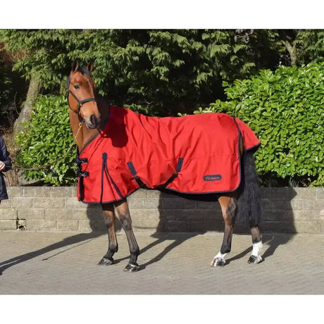 Red horse blanket with black trim adjustable straps and small brand label in whitaker rastrick turnout classically styled rug