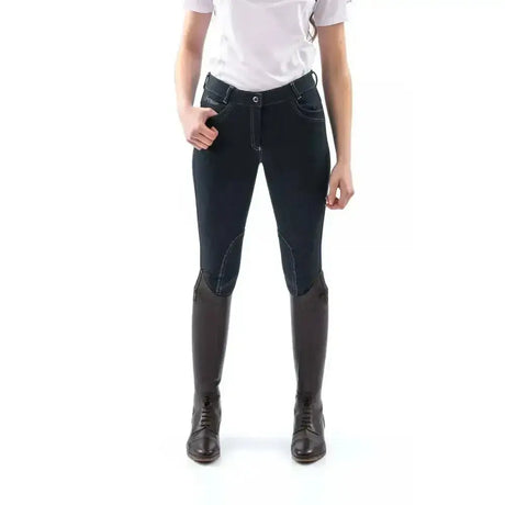 Dark blue whitaker rawdon denim knit breech with reinforced knee patches and classic five-pocket design for riding
