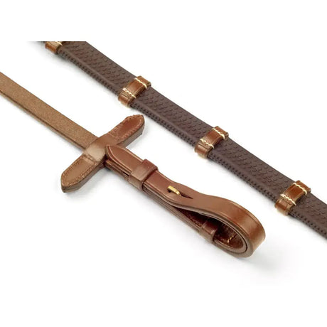 Whitaker rer052 valencia tan leather reins with textured pattern and brass hardware designed for stoppers use