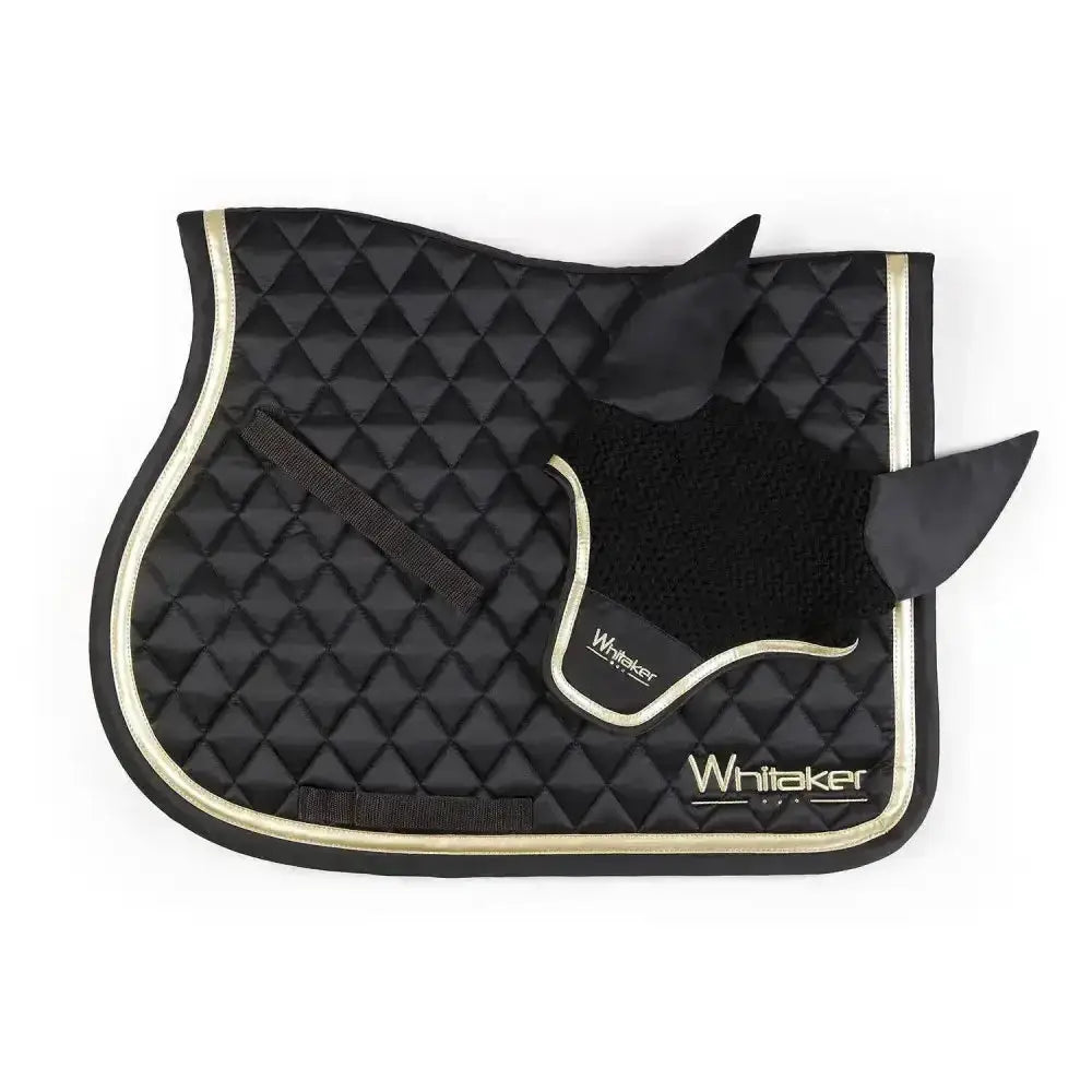 Black quilted horse saddle pad with gold trim and whitaker thornton fly black ear cover featuring whitaker logo