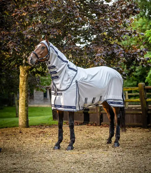 White horse fly veil with navy blue trim and adjustable straps.
