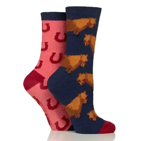 A pair of wild feet cotton ladies cosy socks with silicone grip featuring pink red horseshoes and navy dachshund prints