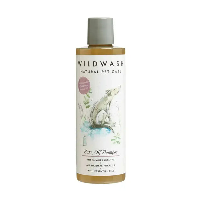 A clear bottle of wildwash buzz off pet shampoo with gray cap and white label showing illustrated dog and golden liquid