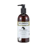 Dark amber glass bottle of wildwash horse shampoo gentle with black pump and zebra-striped label featuring marshmallow root