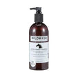 Dark amber glass bottle with black pump of wildwash horse shampoo ultra shine shampoo for natural coat colour care