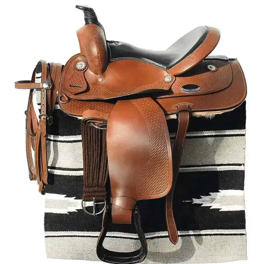 Brown leather windsor colt western saddle with embossed leather detailing soft leather padded seat and silver conchos