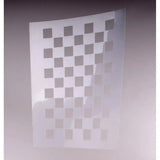 A translucent white plastic stencil with square cutouts for precise horse grooming called windsor quarter markers