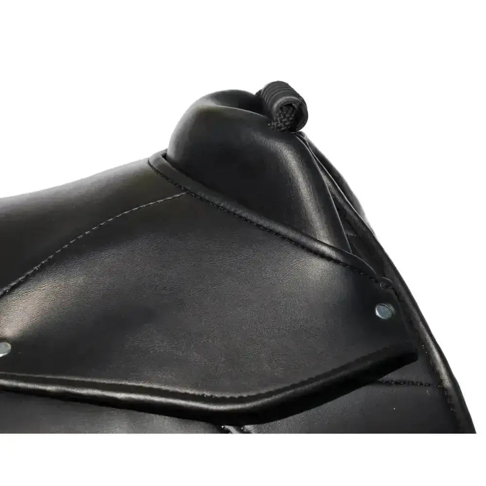 Black leather synthetic cub saddle flap with stitched edges and rolled strap detail on windsor synthetic cub saddle