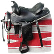 Black leather windsor western saddle with floral animal embossing, silver conchos, and suede seat polished finish