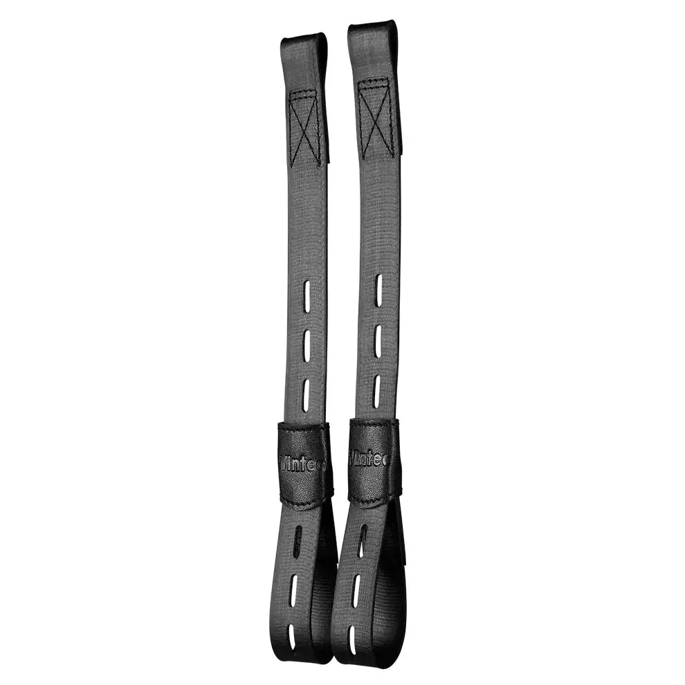 Gray fabric straps with reinforced stitching and leather-like buckle showing intec brand on wintec kids webbers synthetic stirrup