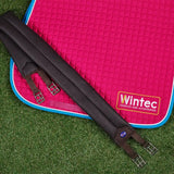 Black quilted horse saddle pad with silver buckles and blue accent paired with wintec miracle girth for increased comfort and anti-galling material