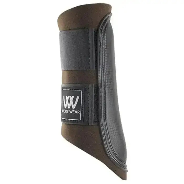 Black and brown woof wear club brushing boots with textured leather finish and adjustable strap closure
