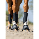 Black perforated woof wear ivent hybrid boot with breathable mesh and front branded logo for horse leg protection