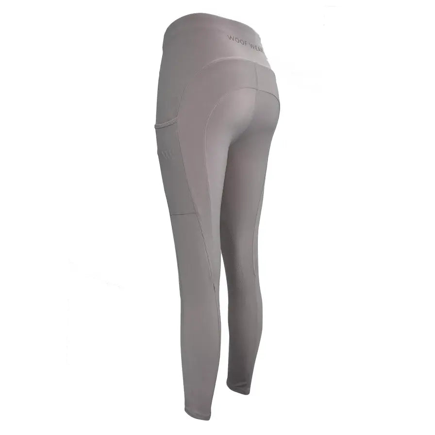 A pair of light gray woof wear original riding tights with knee patches in 4-way stretch fabric and subtle stitching details