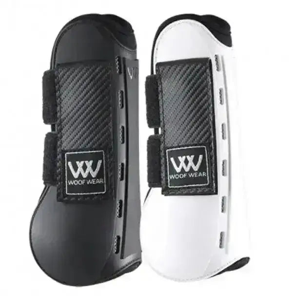Black and white woof wear pro tendon boots with carbon fiber texture accents and breathable design features