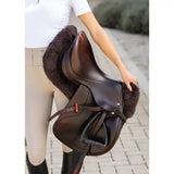 Brown leather english saddle with woof wear sheepskin half pad featuring plush dark brown real lambswool lining and high-wither shape