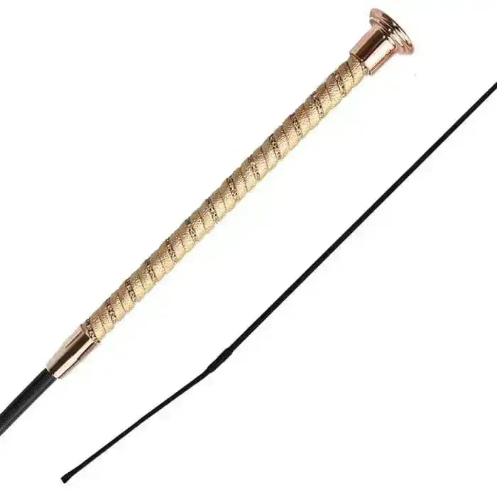 Woof wear twisted dressage whip with gold shimmer grip, textured riding crop, black leather strap, and metallic ferrules