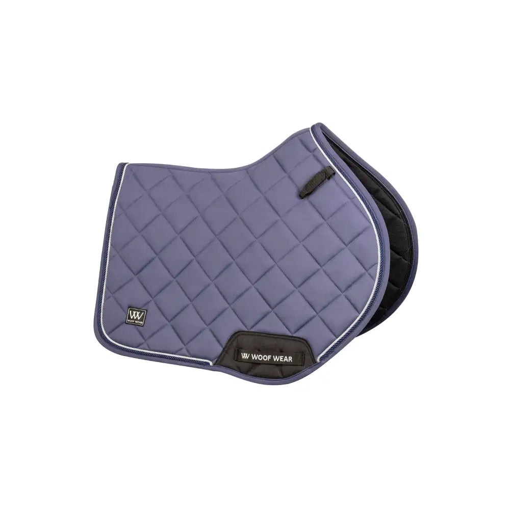 Purple quilted vision aura close contact saddle pad with white stitching black trim and woof wear logo patch
